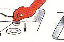 putting the plug into the drain