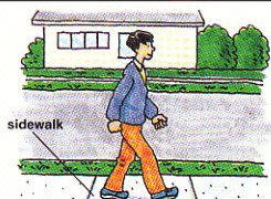 Dan walking on the sidewalk