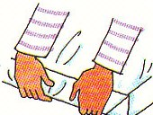 tucking a flat sheet under the mattress