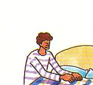 pulling the bedspread over the pillows