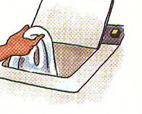 taking the wet clothes out of the machine