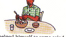 helping himself to salad