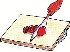 slicing tomatoes on a cutting board
